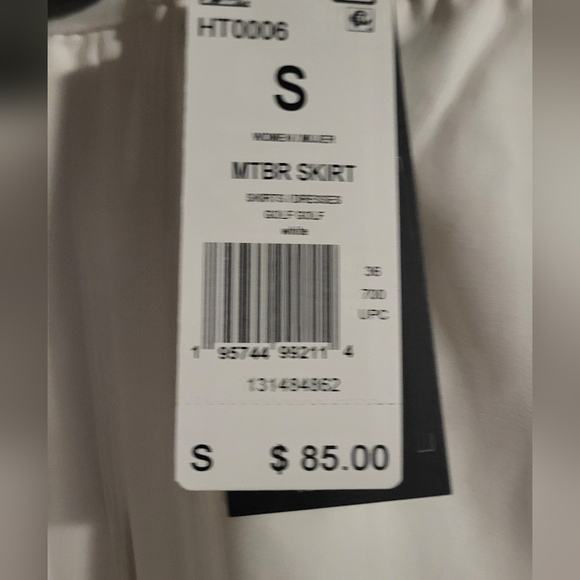 NWT Adidas golf or tennis skort. Front pockets.  White.  Orange logo. Size Small - Picture 4 of 7